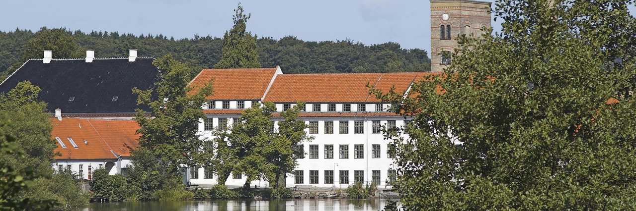 Brede Works seen across the lake