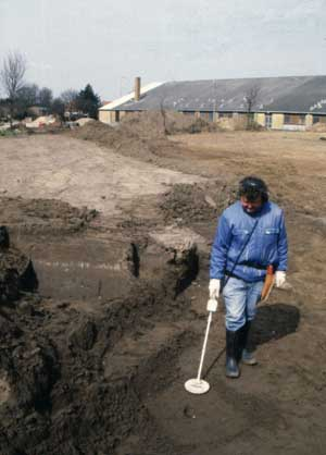 Archaeology with metal detectors and digging machines