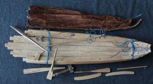 Model of a catamaran (5 logs) with equipment.